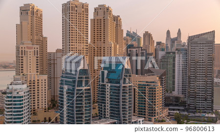 Dubai Marina skyscrapers and JBR district with luxury buildings and resorts aerial timelapse Dubai Marina skyscrapers and JBR district with luxury buildings and resorts aerial timelapse 96800613