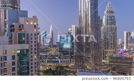 Aerial view of Dubai International Financial Centre district skyscrapers day to night timelapse 96800763