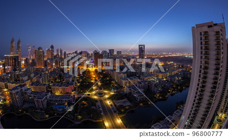 Skyscrapers in Barsha Heights district and low rise buildings in Greens district aerial night to day timelapse. Skyscrapers in Barsha Heights district and low rise buildings in Greens district aerial night to day timelapse. 96800777