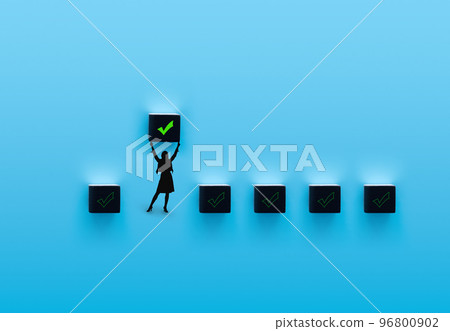 A person holding a check cube between the checkmark cubes and standing 96800902