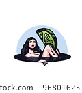 Cocktail Woman. A beautiful woman lies in a glass or a pond and holds a lemon or lime in her legs 96801625