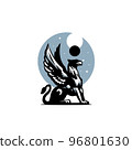 Griffin And Eclipse The griffin sits on its hind legs with its wings spread. In the background, the moon blocks the sun, creating a solar eclipse. 96801630