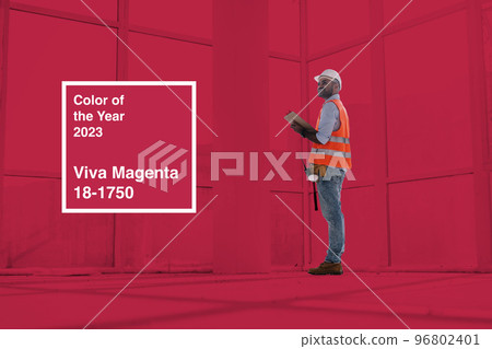 Foreman at work on construction. Color of the year 2023, viva magenta. Foreman at work on construction. Color of the year 2023, viva magenta. 96802401