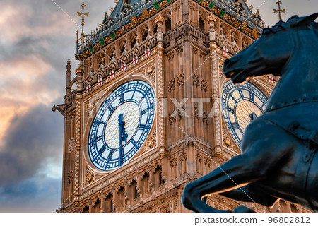 Close up view of the Big Ben clock tower and horse statue monument in the foreground. Amazing details after renovation of the Big Ben. 96802812