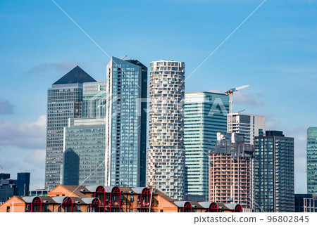 Corporate Office buildings in Canary Wharf, London. Close up view of the skyscrapers in London, UK. Corporate Office buildings in Canary Wharf, London. Close up view of the skyscrapers in London, UK. 96802845