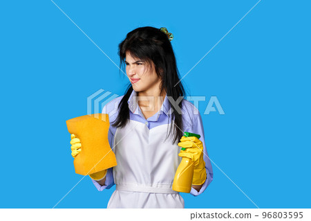 woman gloves and cleaner apron with sponge and detergent sprayer 96803595