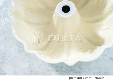 Close up view. Cake batter in a bundt cake pan to bake funfettti bundt cake. 96805029