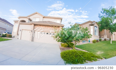 View of the typical suburban neighborhood on a summer morning. 96805230