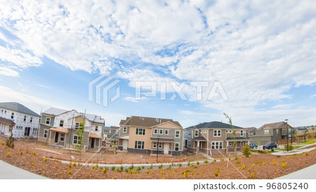 View of the typical suburban neighborhood on a summer morning. 96805240