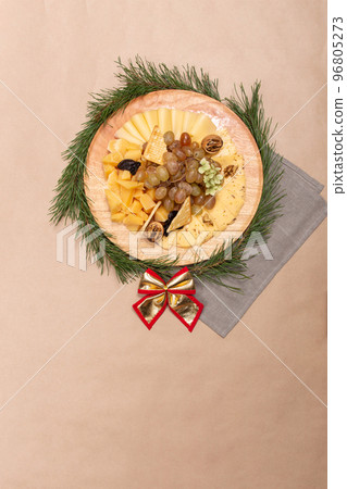Christmas snacks on rustic wooden board Christmas snacks on rustic wooden board 96805273