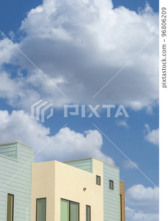Vertical White puffy clouds Residential buildings with different designs at La Jolla, Califo 96806209