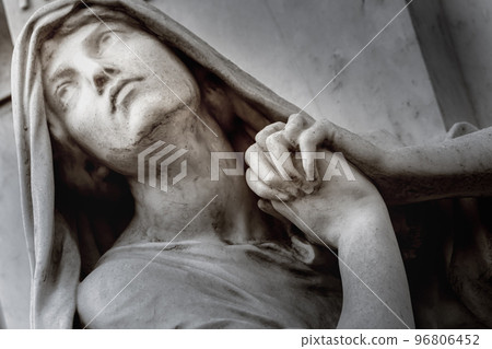 Faithfull Virgin Mary with praying hands and blessing, looking at the sky Faithfull Virgin Mary with praying hands and blessing, looking at the sky 96806452