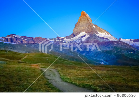 Matterhorn above zermatt idyllic valley at sunrise, Swiss Alps 96806556