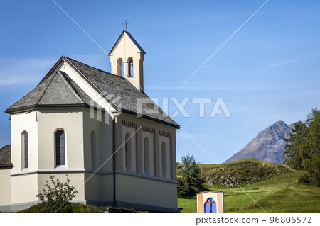 Idyllic landscape of Ardez church, Engadine, Swiss Alps, Switzerland Idyllic landscape of Ardez church, Engadine, Swiss Alps, Switzerland 96806572