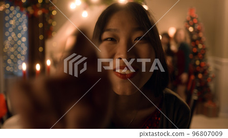 Multi cultural family takes group photo 96807009