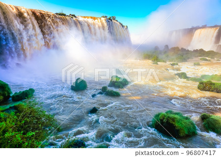 Above Iguacu falls with rainbow, Brazil and Argentina rainforest border Above Iguacu falls with rainbow, Brazil and Argentina rainforest border 96807417