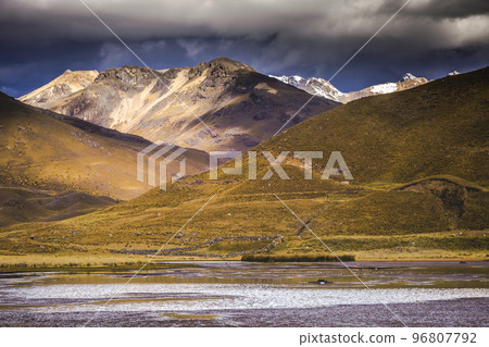 Turquoise lake reflection in Cordillera Blanca, snowcapped Andes, Ancash, Peru 96807792