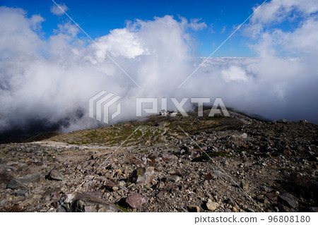 Looking down from a high place, clouds approaching the ropeway platform Looking down from a high place, clouds approaching the ropeway platform 96808180