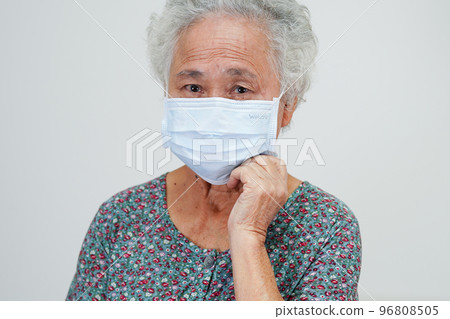 Asian elderly woman patient wearing a mask for protect Covid-19 Coronavirus. Asian elderly woman patient wearing a mask for protect Covid-19 Coronavirus. 96808505