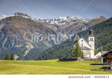 Idyllic landscape of church in Engadine valley, Swiss Alps, Switzerland 96808613