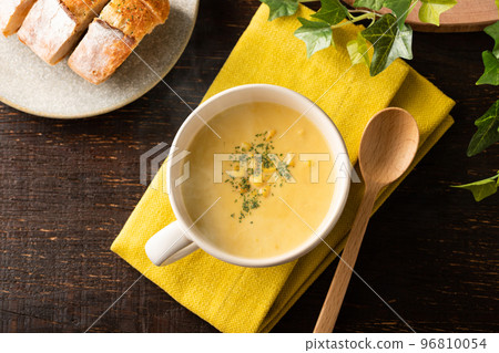 Warm corn potage soup with a gentle steam 96810054