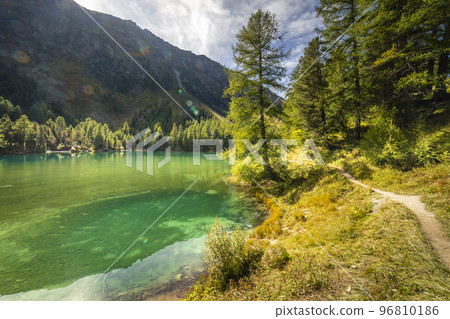 Alpine Lake Palpuogna at Albula Pass in Graubunden alps, Grisons, Switzerland Alpine Lake Palpuogna at Albula Pass in Graubunden alps, Grisons, Switzerland 96810186