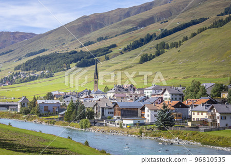 Idyllic landscape of village in Engadine valley, Swiss Alps, Switzerland Idyllic landscape of village in Engadine valley, Swiss Alps, Switzerland 96810535