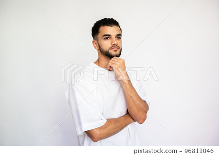 Portrait of pensive young man looking away 96811046