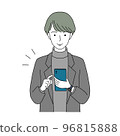 A young man who operates a smartphone with a smile 96815888