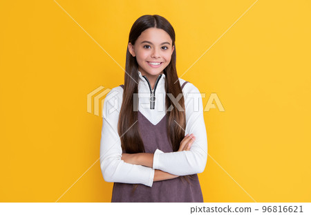 happy child with long hair on yellow background happy child with long hair on yellow background 96816621
