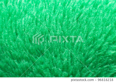 Green fluffy textile texture. Nappy hairy background closeup. 96818218