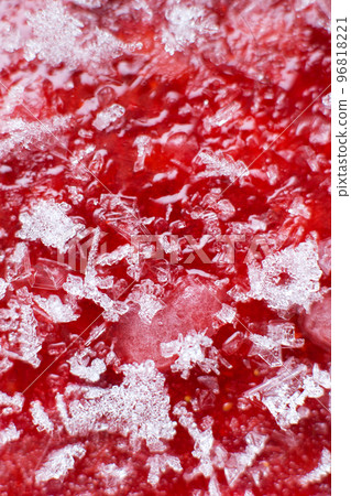 Mashed red fresh frozen strawberries background closeup Mashed red fresh frozen strawberries background closeup 96818221