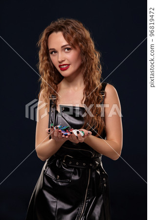 Casino concept. Portrait of young pretty caucasian woman, playing in casino. Roulette, poker chips, cards, wheel, isolated white background 96819472