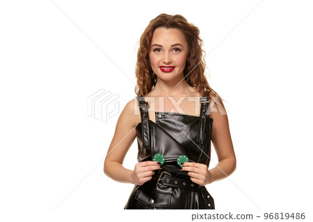 Casino concept. Portrait of young pretty caucasian woman, playing in casino. Roulette, poker chips, cards, wheel, isolated white background 96819486