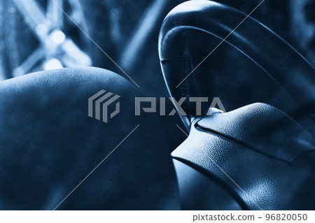 Closeup of steering wheel of a car, interior view 96820050