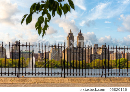 Skyline panorama with Eldorado building and reservoir with fountain in Central Park in midtown Manhattan in New York City Skyline panorama with Eldorado building and reservoir with fountain in Central Park in midtown Manhattan in New York City 96820116