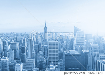 New York City Manhattan midtown aerial panorama view with skyscrapers, sepia sunset toning New York City Manhattan midtown aerial panorama view with skyscrapers, sepia sunset toning 96820370