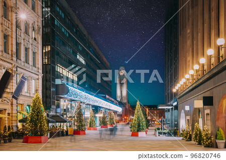 Helsinki, Finland. Night Starry Sky Above Shopping Mall And Helsinki Central Railway Station. Night View Of Keskuskatu Street In Evening Christmas New Year Xmas Festive Illumination. Bright Stars Helsinki, Finland. Night Starry Sky Above Shopping Mall And Helsinki Central Railway Station. Night View Of Keskuskatu Street In Evening Christmas New Year Xmas Festive Illumination. Bright Stars 96820746