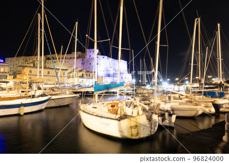 Night view of Egg Castle and yacht harbor in Naples, Italy 96824000
