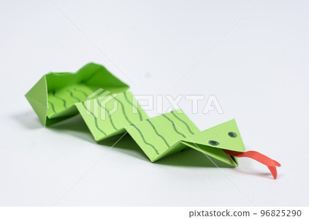 Origami green snake, DIY paper crafts, white background 96825290