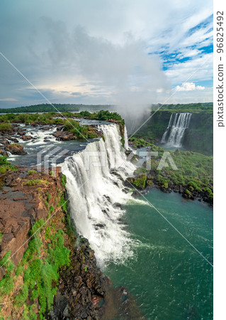 Iguazu Falls on the border of Brazil and Argentina in South America Iguazu Falls on the border of Brazil and Argentina in South America 96825492