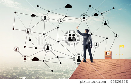 Businessman on house roof presenting networking and connection c Businessman on house roof presenting networking and connection c 96826338