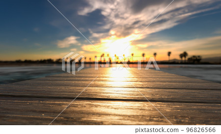 A long pier leading out onto the sea on sunset. 3d rendering A long pier leading out onto the sea on sunset. 3d rendering 96826566