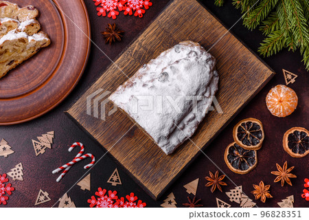 Tasty christmas stollen with marzipans, dried fruits and nuts 96828351