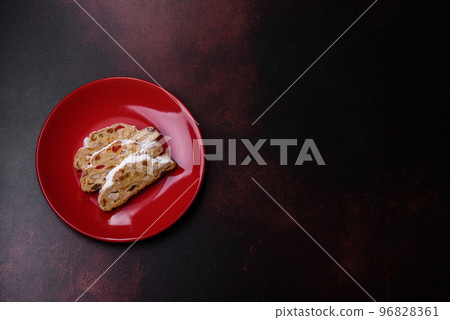 Tasty christmas stollen with marzipans, dried fruits and nuts 96828361