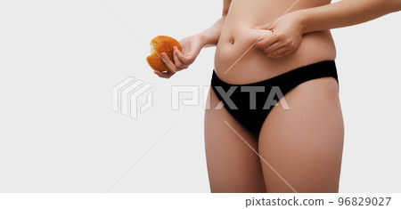Mid Section Of A Woman With Excessive Belly Fat 96829027