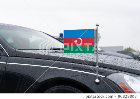 Flag of Azerbaijan. A car from the motorcade of the President of Azerbaijan. Flag of Azerbaijan. A car from the motorcade of the President of Azerbaijan. 96829808
