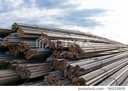 Steel rods bars can used for reinforce concrete. Reinforced iron for concrete construction. Steel rods bars can used for reinforce concrete. Reinforced iron for concrete construction. 96829809