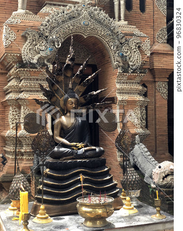 Dark Statue of Budha 96830324