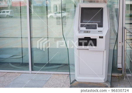 Close-up of a ticket vending machine with a blank black screen 96830724
